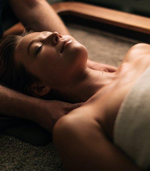 Woman getting a massage at Glen Ivy