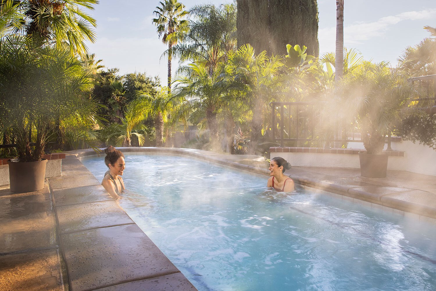 Women enjoying the Vista Pool with steam
