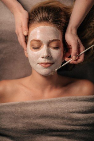 Woman getting facial at Glen Ivy
